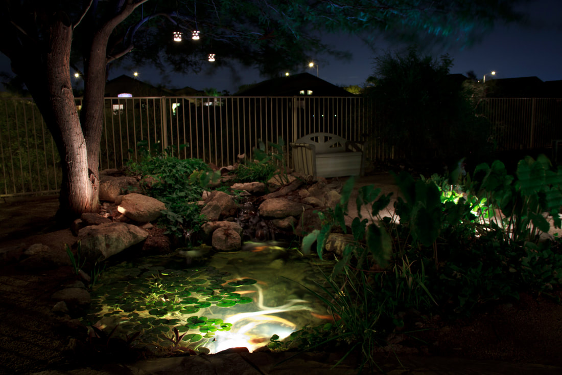 garden lighting ideas with waterfall